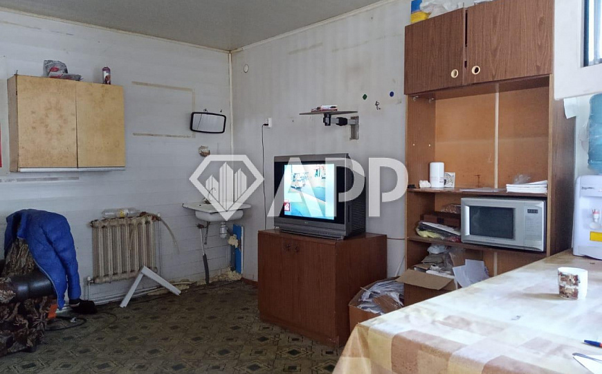 Продам базу со складскими и офисным помещением общей площадью 1080 м² и 0,5 ГА земли фото