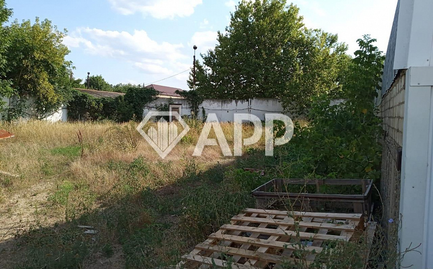 Продам базу со складскими и офисным помещением общей площадью 1080 м² и 0,5 ГА земли фото