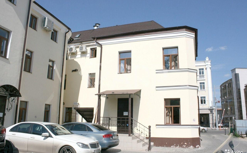 Здание 873 м² с участком в центре фото