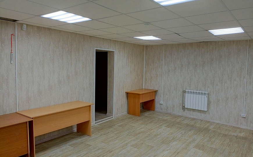 Отдельно стоящее здание со стоянкой 100 м2 фото