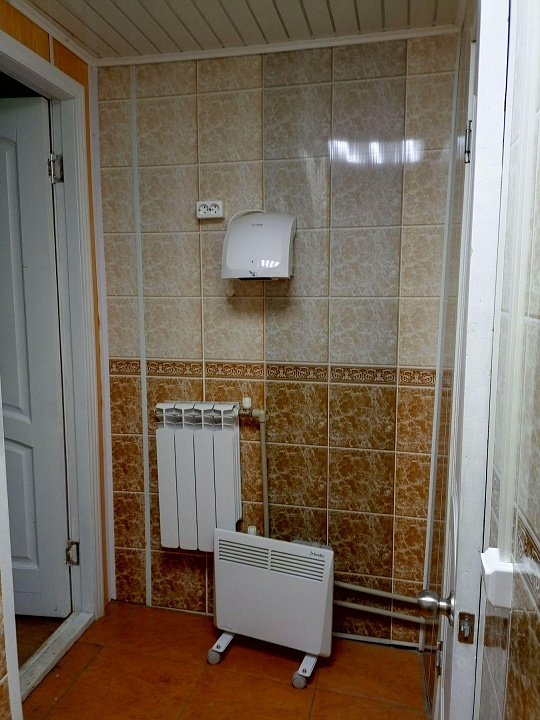 Отдельно стоящее здание со стоянкой 100 м2 фото