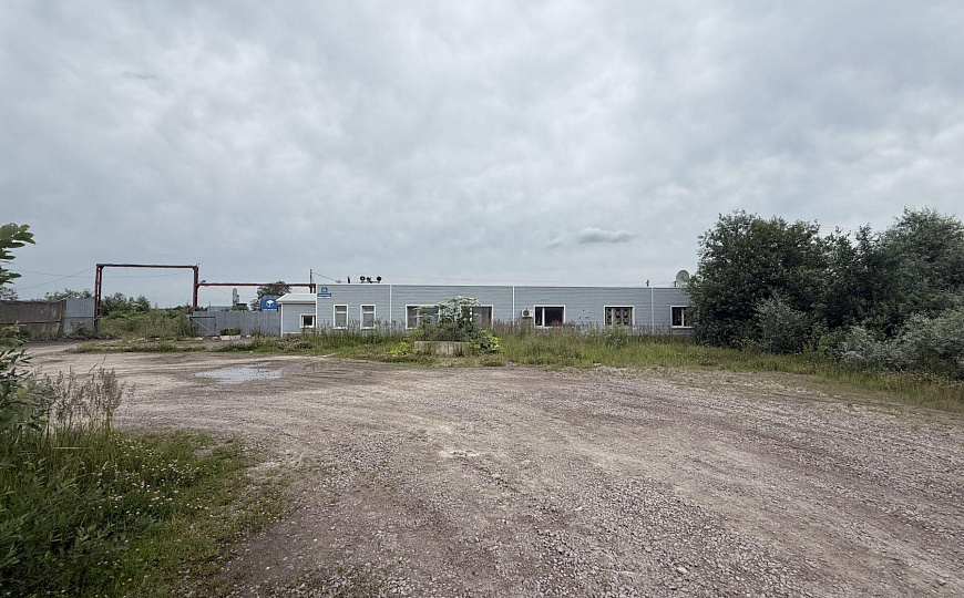 Продам ЗУ 3,38га с пром строениями 1 800 м²  фото