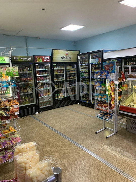 Продается помещение с действующим продуктовым маркетом на полуцокольном этаже фото