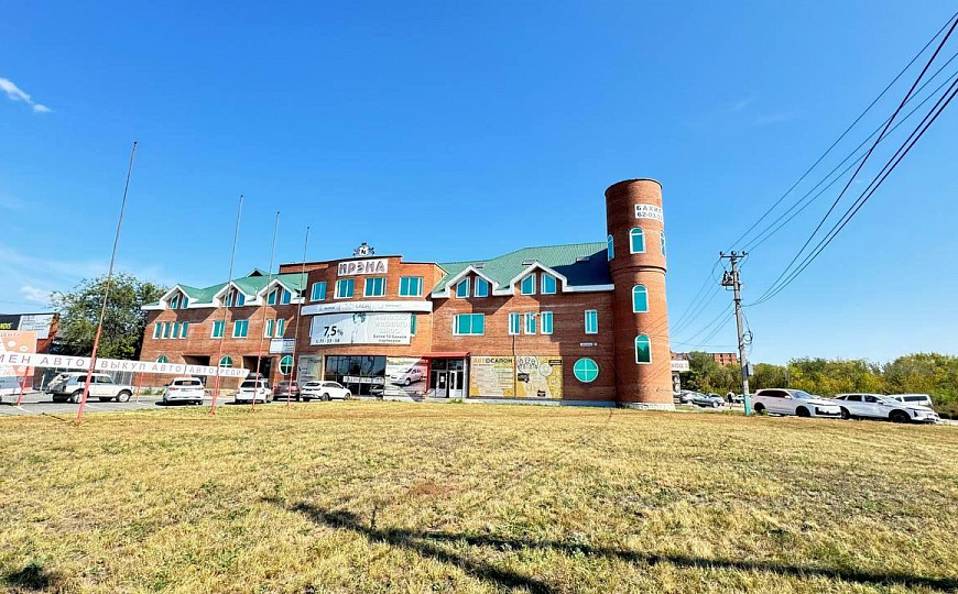 Многопрофильное здание и земельный участок, 6 000 м² фото