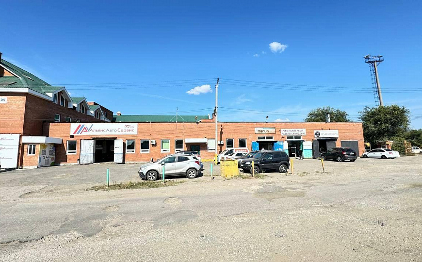 Многопрофильное здание и земельный участок, 6 000 м² фото