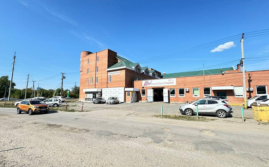 Многопрофильное здание и земельный участок, 6 000 м² фото