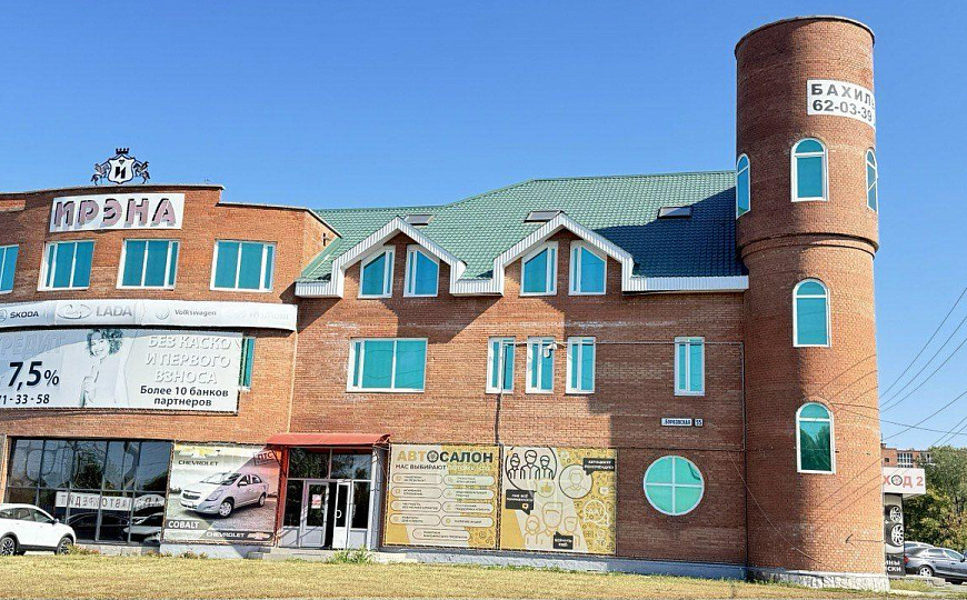 Многопрофильное здание и земельный участок, 6 000 м² фото