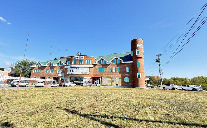 Многопрофильное здание и земельный участок, 6 000 м² фото