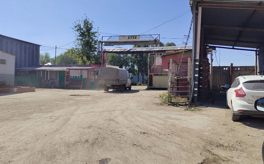 Открытая площадка на территории охраняемой базы, 1 500 м²  фото