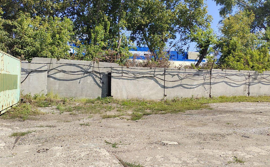 Открытая площадка на территории охраняемой базы, 1 500 м²  фото