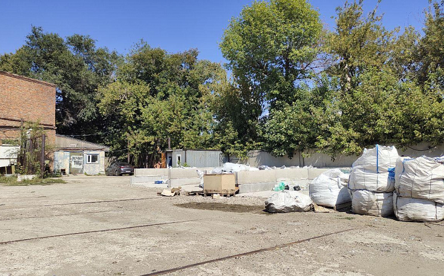 Открытая площадка на территории охраняемой базы, 1 500 м²  фото