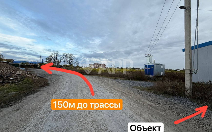 Склад с удобным подъездом рядом с городом 1 400м2 фото