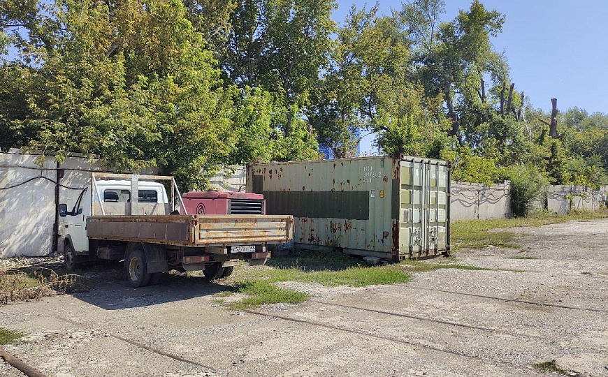 Открытая площадка на территории охраняемой базы, 5000 м²  фото