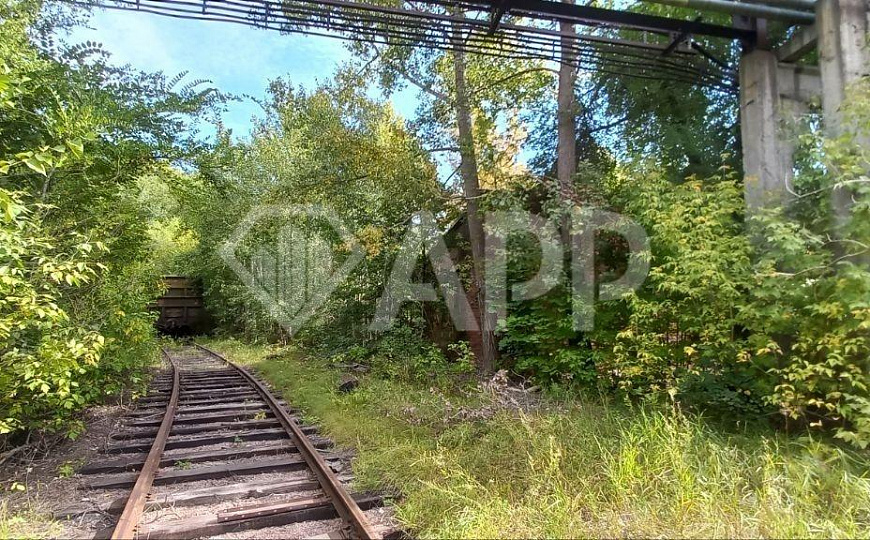 Продам пром.участок 18сот. у ЖД ветки фото